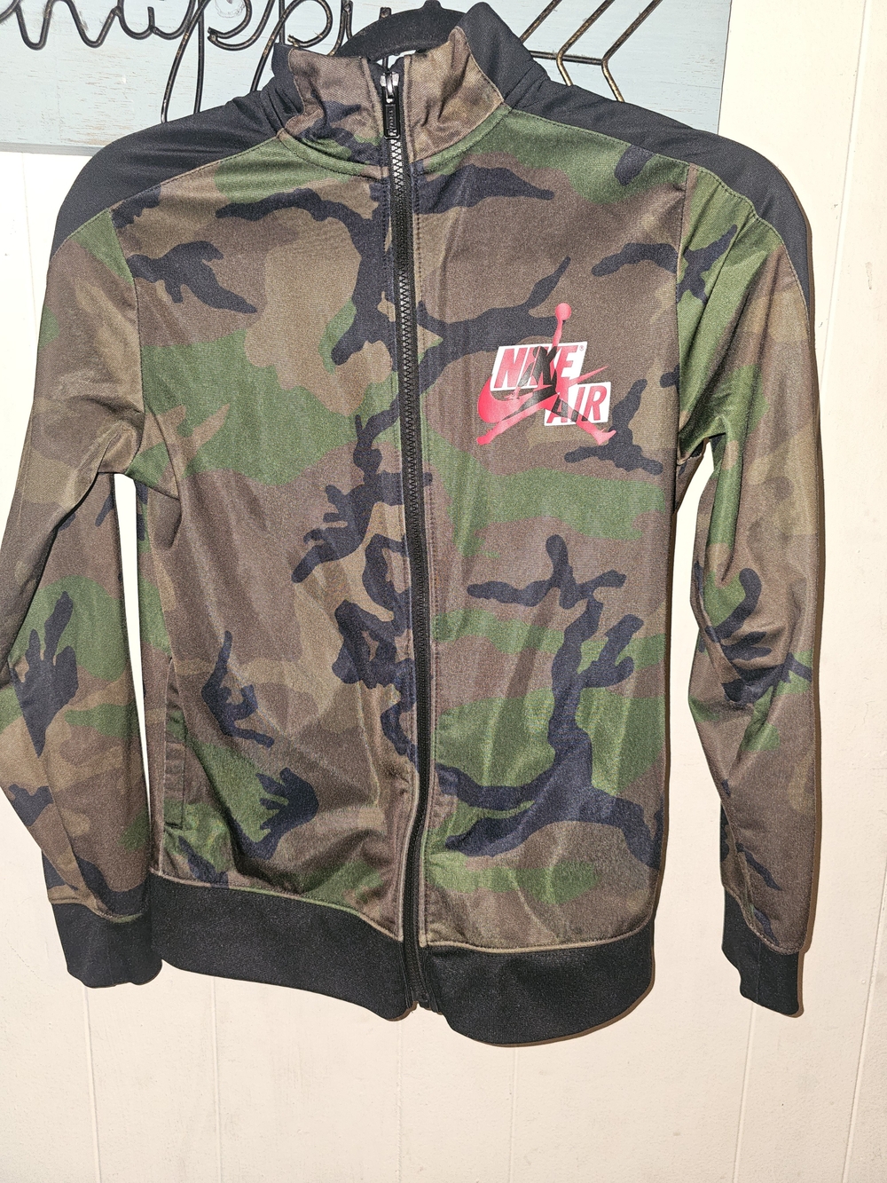 Jordan Kids Large Camo Bomber Jacket with Black Accents and Red Logo